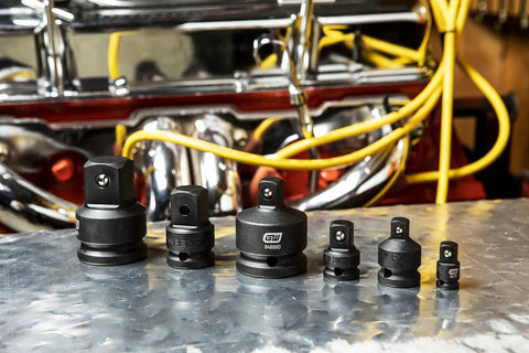 Six Piece Drive Impact Socket Adapter Set For 1/4, 3/8, 1/2, 3/4 Inch Drives With Pin Retention, CR-MO Alloy, on metal surface.
