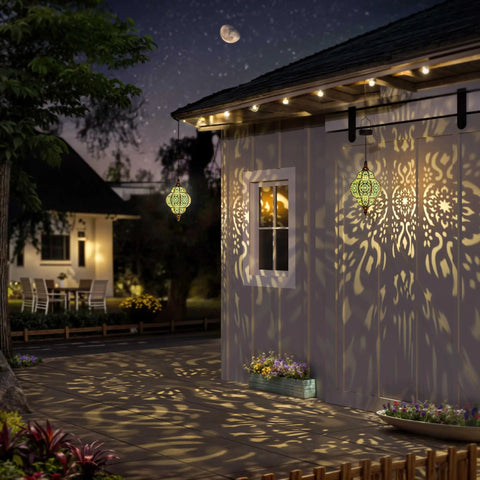 Hanging Solar Lanterns for Outdoor Decor Bronze Waterproof Garden Lights with Moroccan Style casting floral patterns on house wall