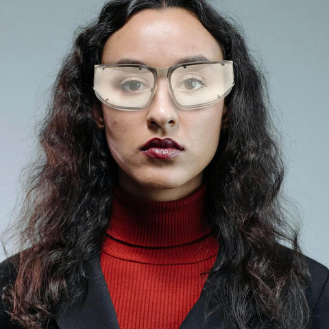 Woman wearing Dope Metal Frame Retro Sunglasses For Women With Hollow Design, Street Style Summer Outdoor Shades