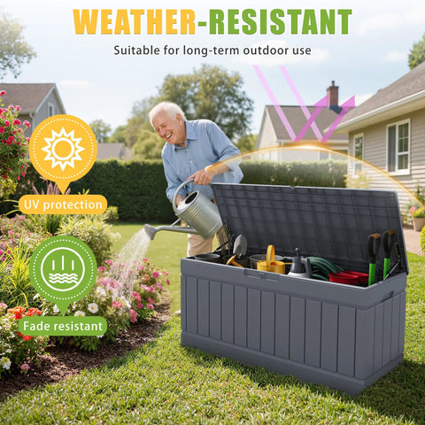 Man using 82 Gallon Outdoor Storage Box With Lid For Patio Furniture Garden Tools And Pool Supplies Weatherproof UV Resistant Lockable Gray Backyard Organizer Pro on grass