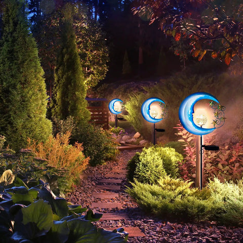 Solar Powered Outdoor Lights Moon And Star Garden Stake Decor for pathways, featuring glowing moon and star design in garden setting