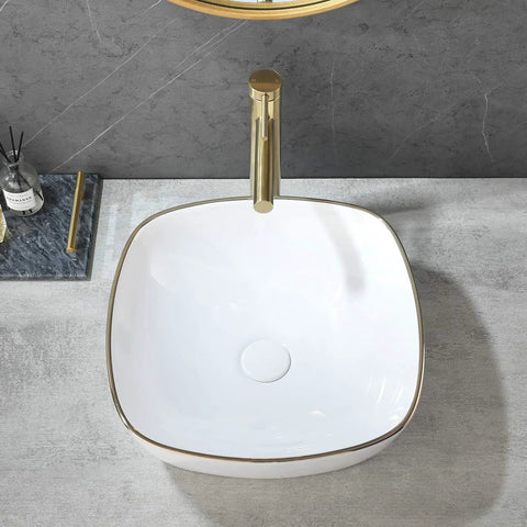 Modern Square 16 By 16 White Porcelain Vessel Sink With Gold Trim For Lavatory Vanity Cabinet, overhead view on gray counter