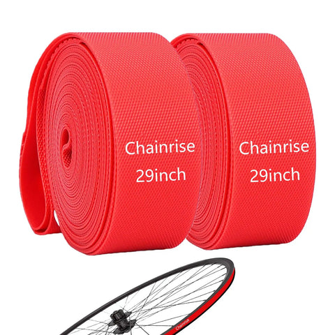 Pair of red Chainrise 29 inch rim strip protectors with bicycle wheel, Rim Strip Protector For Road And Mountain Bikes, High Strength Nylon Anti Puncture Rim Liner, Universal Fit For 20 24 26 27.5 29 And 700C Wheels, Inner Tube Guard No More Flats, Red 2 Pack.