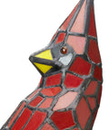 Close-up of red stained glass bird lamp with Tiffany style vibe, detail of bird's head and patterns.