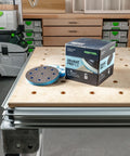 Box and disc of Granat Profile Fine 5 Inch 125 mm Sanding Discs 10 Pack For Contours Moldings And Curved Surfaces on workbench