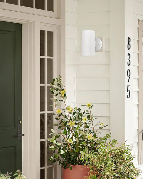 Outdoor Wall Light Sconce Set Two Pack Exterior White Modern Cylinder Style With Tempered Glass Cover Weatherproof Aluminum Housing Ideal For Porch Front Door Garage And Patio Lighting No Fuss Install shown by a front door