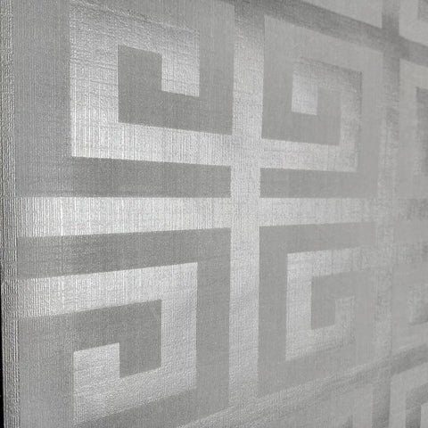 Modern Geometric Greek Key Wallpaper With Metallic Matte Finish close-up of gray silver design, ideal for accent walls and bathrooms.