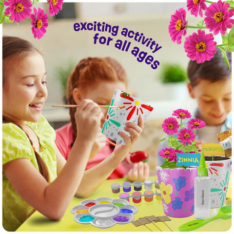 Kids using Paint And Plant Stoneware Flower Garden Kit For Kids 6 To 12 with paints, pots, tray, markers, and seeds.
