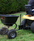 Tow Behind Broadcast Spreader With Universal Hitch 125 Lb Capacity Durable Poly Hopper for Lawn Seeds Fertilizer and Ice Melt