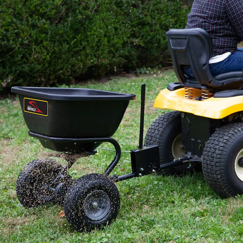 Tow Behind Broadcast Spreader With Universal Hitch 125 Lb Capacity Durable Poly Hopper for Lawn Seeds Fertilizer and Ice Melt