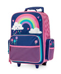 Front view: Stephen Joseph kids rolling luggage with wheels, navy body, rainbow arc and cloud, pink side pockets