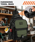 Heavy Duty Electrician Tool Chest Bag With 21 Tough As Nails Pockets And Waterproof Oxford Fabric Tactical HVAC Work Sling hanging on a tool shelf.