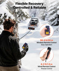 Portable Workhorse Winch 6000 Lbs 12V DC Electric With Synthetic Rope Wireless And Wired Remotes Box Style Recovery Kit With Fairlead Clevis Hook And Strap For ATV UTV Off Road Pulling Tasks. Wireless and wired remote control in snowy off-road recovery scene.