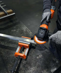 Heavy Duty Cordless Angle Grinder 115mm With Slick Brushless Motor And 18V Power For Smooth Sanding Deburring And Precision Jobsite Cutting in use on metal workpiece.