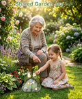 Grandmother and child enjoying garden with Solar Frog Garden Statue With Realistic Succulent And 7 LED Lights.