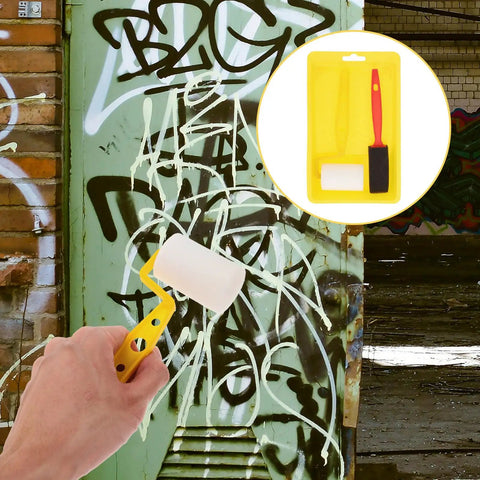 Take Care Of Sweat Equity Projects With This No Sweat Painting Kit Featuring Tough Bristle Brushes Effortless Paint Tray And Thick Sponge Rollers For Smooth Walls. Mini paint roller in hand on a graffiti-covered surface.