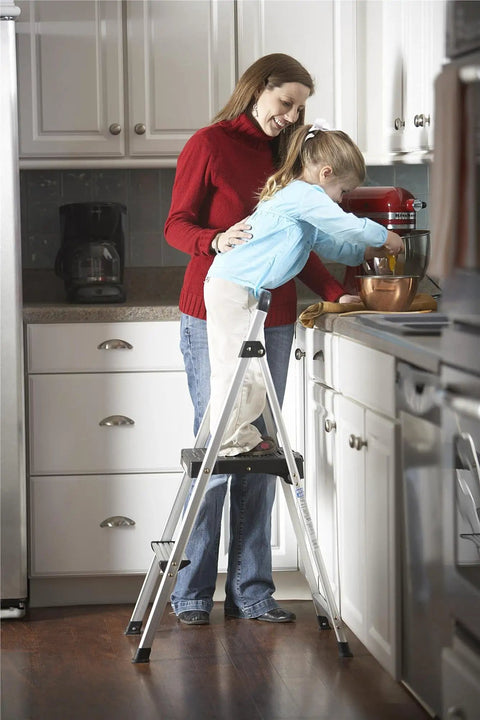 Woman and child on Lite Folding Step Stool With Extra Large Slip Resistant Platform, Aircraft Grade Aluminum Build, Non Marring Feet