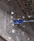 Top Rated Tri Flute Wood Drill Bit For Knocking Out Clean Holes Fast Through Lumber Builds With A Sturdy Hex Shank That Locks Tight In Any Quick Change Chuck in action, drilling through wood.
