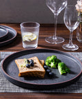 Top Tier Real Deal 12 Piece Stoneware Dinnerware Set With Sleek Matte Finish Includes Four Dinner Plates Salad Dishes And Cereal Bowls Lead Free Game Changer Kitchen Essentials on a table