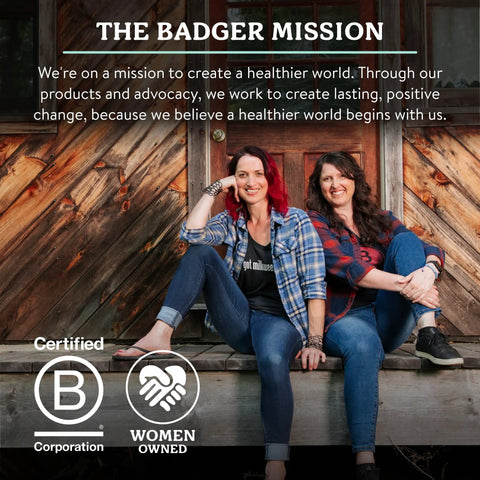 Two women sitting on a wooden stoop, showcasing sustainability and women-owned business certification logos