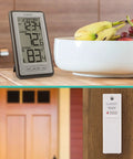 Indoor Outdoor Thermometer with Wireless Sensor, Humidity Monitor, and 24 Hour Display for Home, Office, or Patio on table