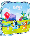 Front view of Bluey Themed 12 Inch Girls BMX Bike with colorful decals featuring Bluey and Bingo, part of the handlebar bag design.