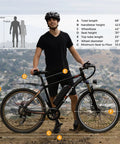 Man standing with Electric Mountain Bike For Adults With 1000W Peak Motor and 20 MPH Top Speed, 26 Inch Front Suspension.