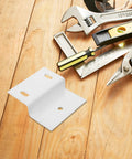 Z Shape Cabinet Corner Brace Bracket Heavy Duty Iron Shelf Support Connector on wooden surface with tools