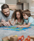 Family playing with Large 200 Piece World Map Puzzle For Kids And Adults Floor Jigsaw Map For Learning Geography on carpet