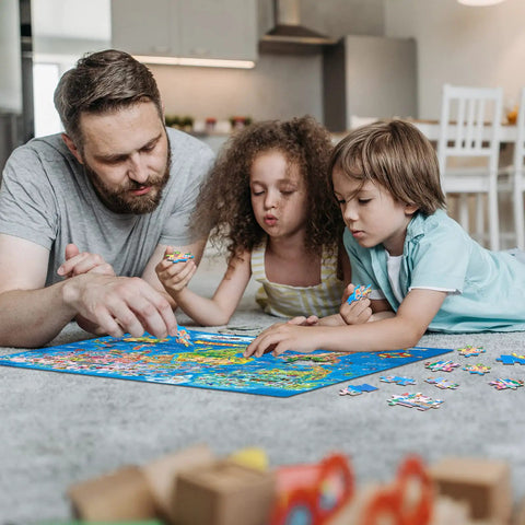 Family playing with Large 200 Piece World Map Puzzle For Kids And Adults Floor Jigsaw Map For Learning Geography on carpet