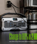 Portable Power Station and Solar Generator 400W Peak, 183Wh Lithium Battery with LED display and outlets on a counter