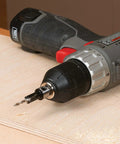 Drill with 7/64 Inch By 3/8 Inch Carbide Tipped Countersink Set With Brad Point Pilot on plywood