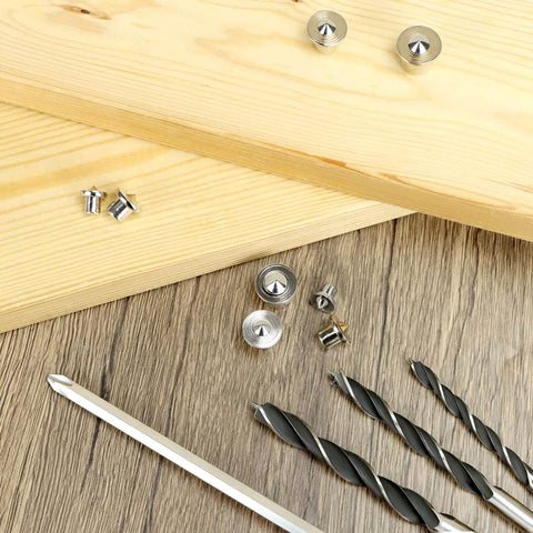 Pro Grade Dowel And Tenon Center Transfer Plugs For Woodworking, 20 Piece Chrome Steel Set on a wooden background with tools