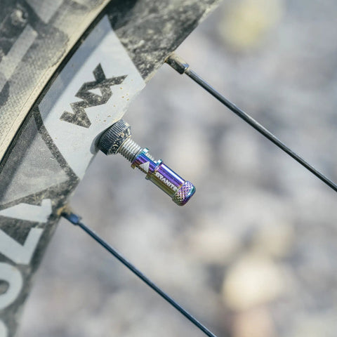 Presta Valve Cap With No Tool Needed Built In Valve Core Remover And Dust Cover Easy To Use Alloy Tire Cap on a bike wheel