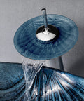 Game Changing Shell Shape Vessel Sink With Tempered Glass Bathroom Vanity Basin, Includes Faucet And Pop Up Drain, Above Counter Washbasin, Smooth Finish Wipes Clean In A Jiffy, Knockout Decor For Modern Spaces - close-up of faucet atop blue tempered glass sink.