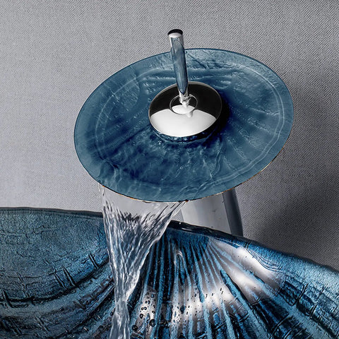 Game Changing Shell Shape Vessel Sink With Tempered Glass Bathroom Vanity Basin, Includes Faucet And Pop Up Drain, Above Counter Washbasin, Smooth Finish Wipes Clean In A Jiffy, Knockout Decor For Modern Spaces - close-up of faucet atop blue tempered glass sink.