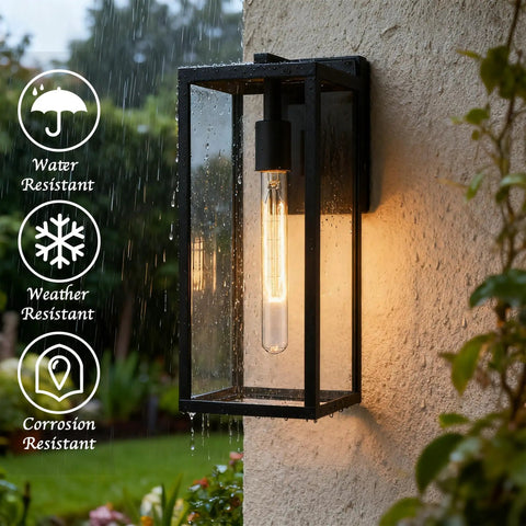 Lit Outdoor Wall Lantern Sconce 13.4 Inch Tall Anti Rust Metal Frame Weatherproof Exterior Light illuminated in rain on wall.
