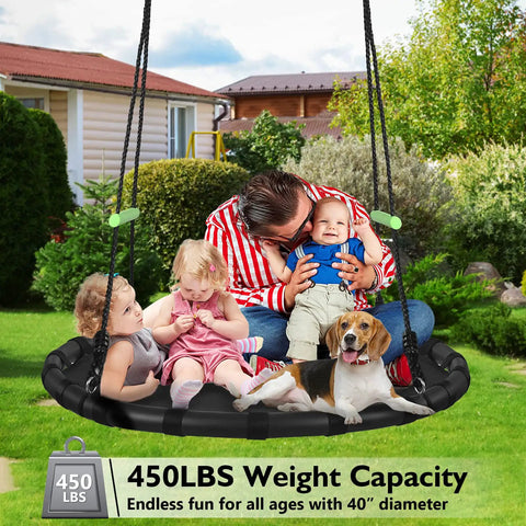 Family enjoying Black Outdoor Saucer Swing With PP Mat For Yard Garden And Park Easy To Install Sturdy Steel Frame Weather Resistant Rope