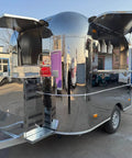 Rock Solid Heavy Duty Mobile Coffee Concession Cart With Spacious Storage Compartments, showing a shiny stainless steel design.