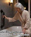 Hella Secure 12 Inch Stair Handrail And Wall Mounted Safety Grab Bar For Indoor Outdoor Steps providing a tight non slip matte black grip.