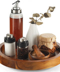 Slick 13 Inch Acacia Wood Lazy Susan Turntable Organizer For Kitchen Cabinets with spices, oils, and decorative vase.