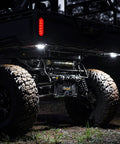 Cyclone V2 LED 5W Flood Beam Light With Clear Lens on off-road vehicle at night
