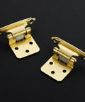 Top Shelf Gold Cabinet Hinges Four Pack Semi Concealed One Half Overlay Smooth Self Closing Silent Glide Soft Close Heavy Duty Hardware For Kitchens And Storage Solutions showing two gold hinges.
