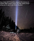 Night scene with person using Catapult V6 SST70 USB C Rechargeable Flashlight With 2836 Lumens And 692m Beam Distance