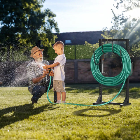 Beefy Freestanding Metal Hose Holder Stand With 4 Anchor Points And 6 Hooks Holds Up To 150 Feet Of Hose in a garden scene
