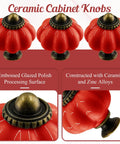 Set Of Eight Red Ceramic Pumpkin Knobs With Heavy Duty Zinc Base And Shiny Embossed Glaze For Vintage Cabinets And Kitchen Drawers. Detailed view of ceramic pumpkin knobs showing embossed glaze and zinc base.