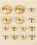 12 Piece Brass Clock Hand Nut Set For Replacement Hardware 5mm 6mm 10mm OD Threaded Fasteners on wooden surface