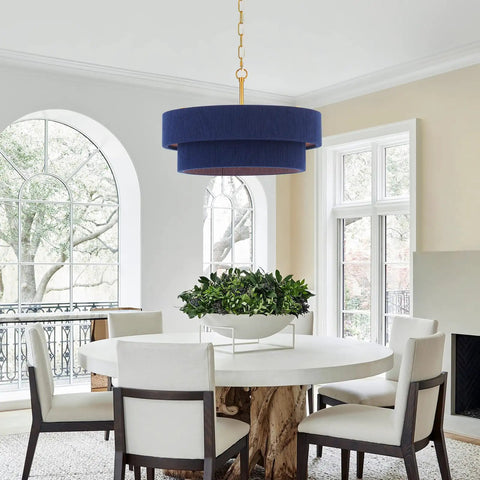 ELYCCUPA 20” Navy Blue Boho Hand Woven Pendant Light Brass Adjustable Coastal Chandelier above a dining table.