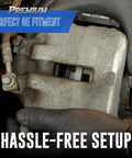 Bendix SBM679 front brake pads installed in caliper, semi-metallic, close-up view