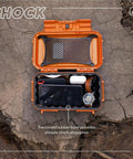 Open EDC 56 Dry Box Go-To Tough Protective Case Made in USA for Organizing Cameras, Phones, Gear on Camping, Fishing, Hiking, and Water Sports Adventures, Orange TOPO Finish with gear inside on wood.